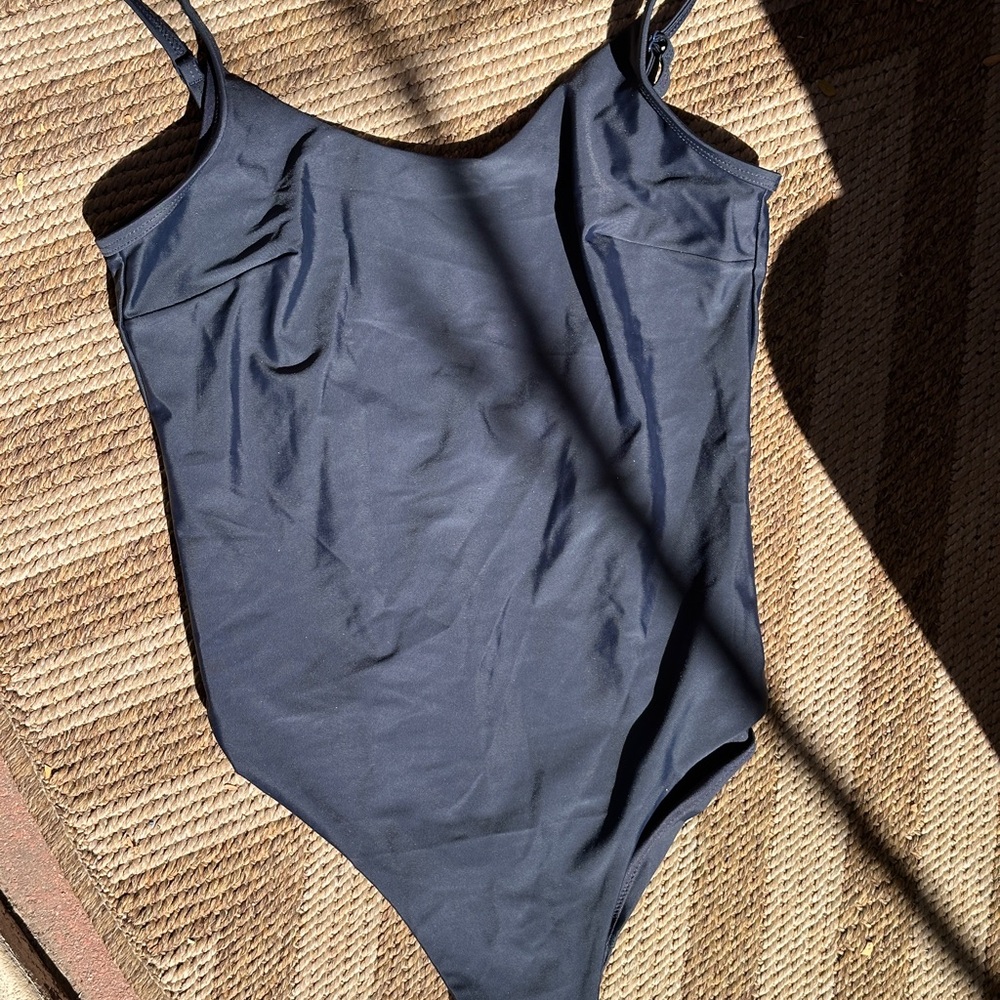 One piece swimsuit in the size 8 brand is COS